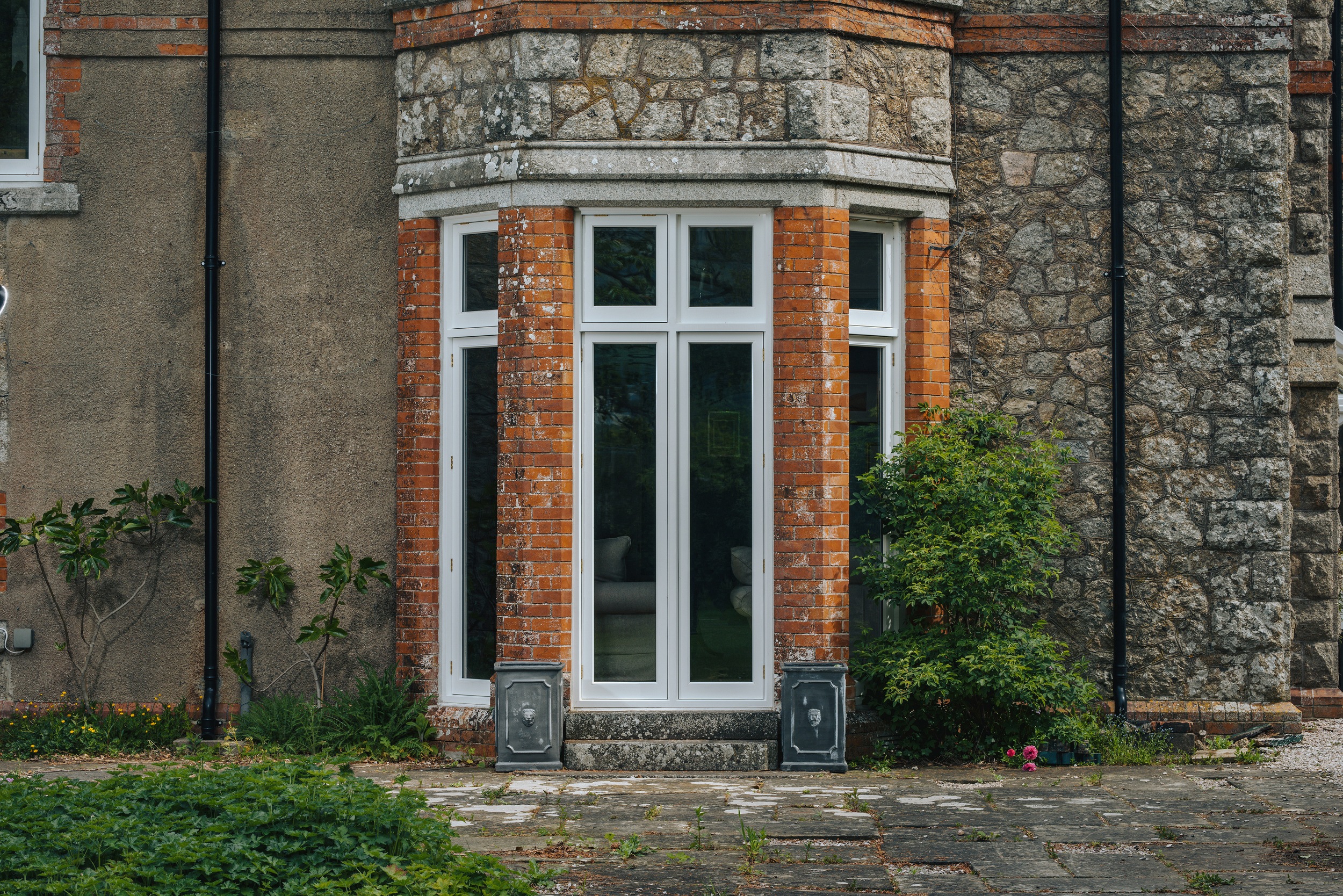 outside view of tall timber windows
