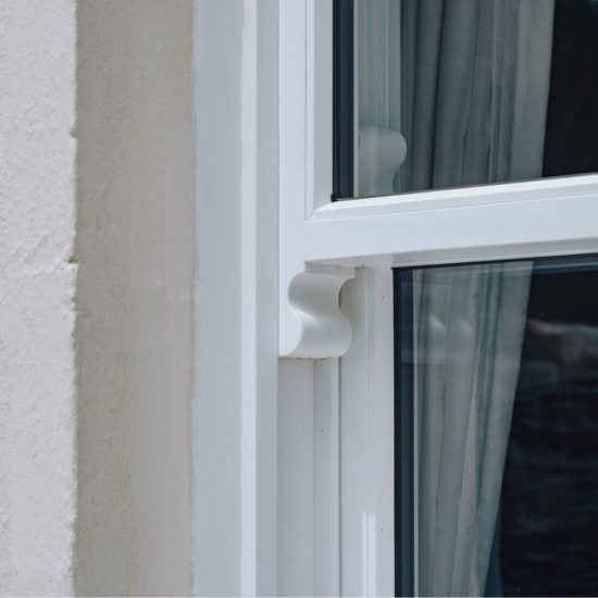 white sliding sash window detailed view