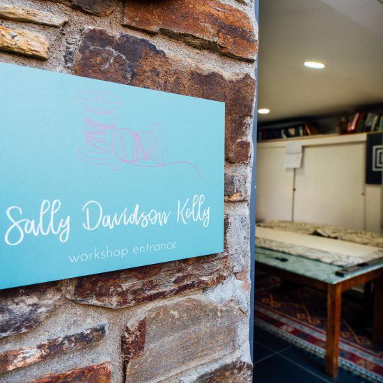 Sally Davidson Kelly plaque wide open door