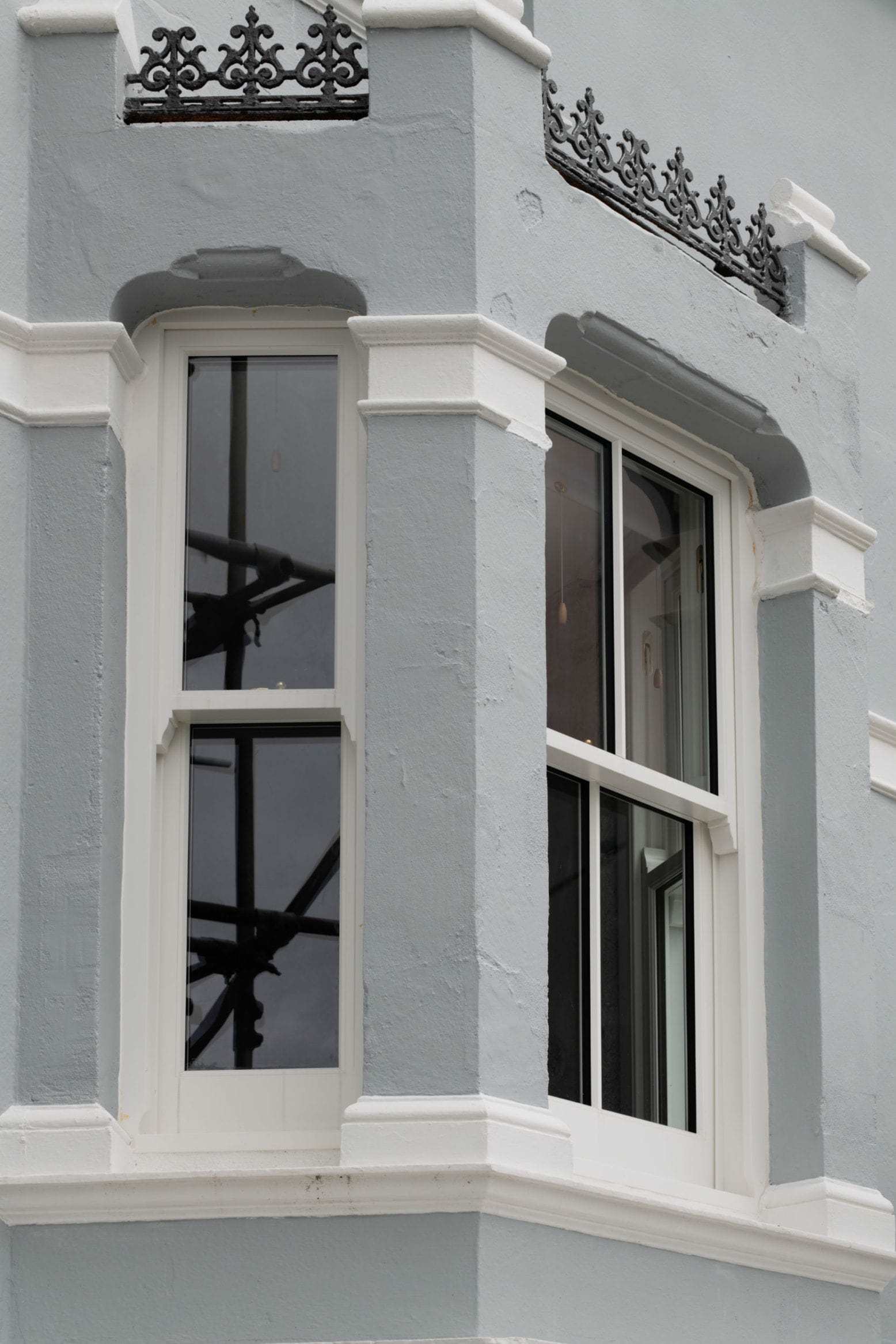 timber sliding sash windows stone blue house top floor window-min