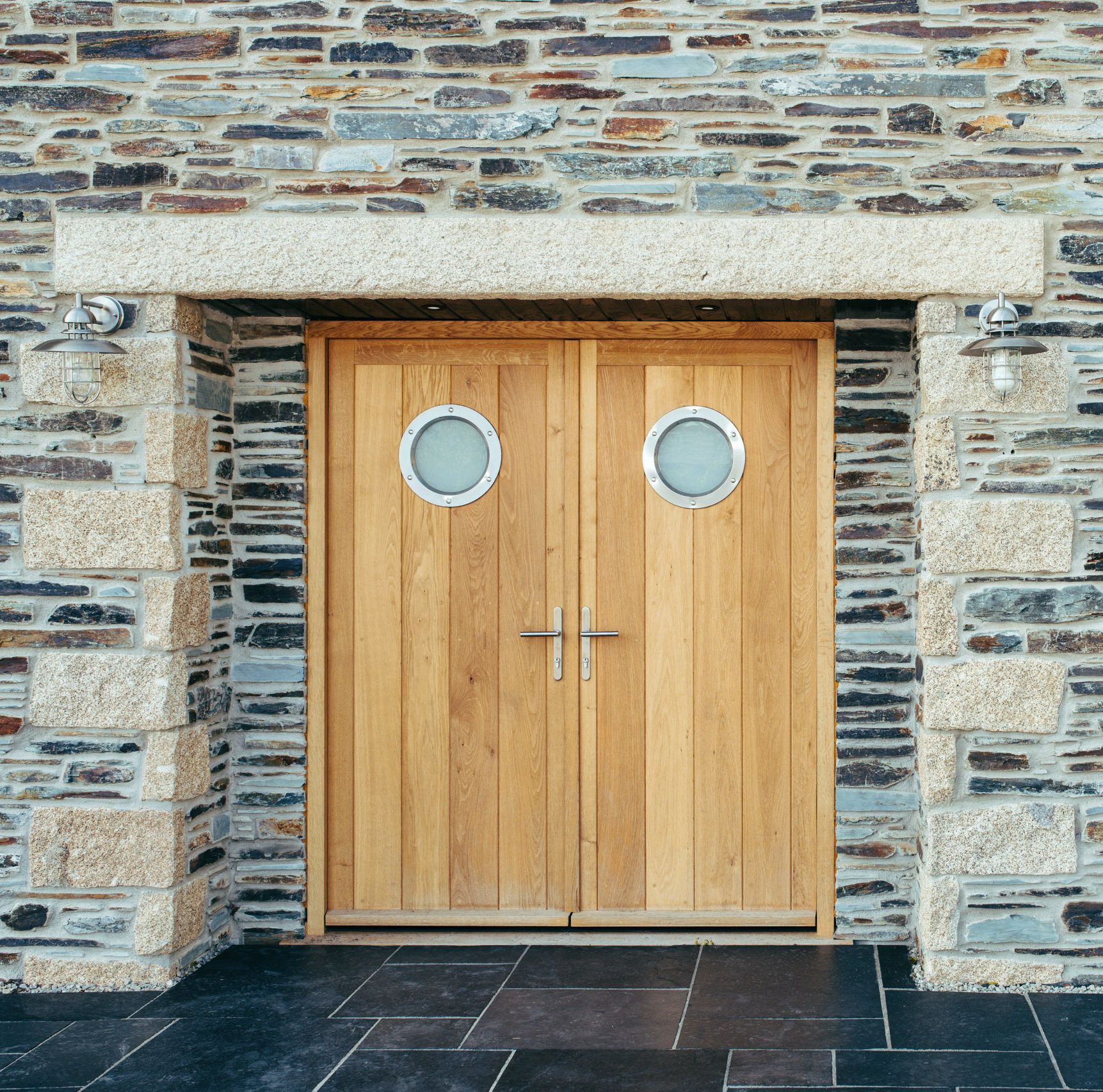 double wooden port hole front door